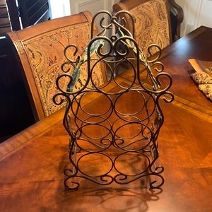 Wine rack with storage for seven bottles